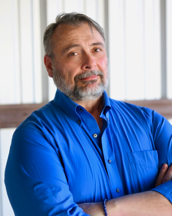 image of Henry Lee Butler in blue shirt.